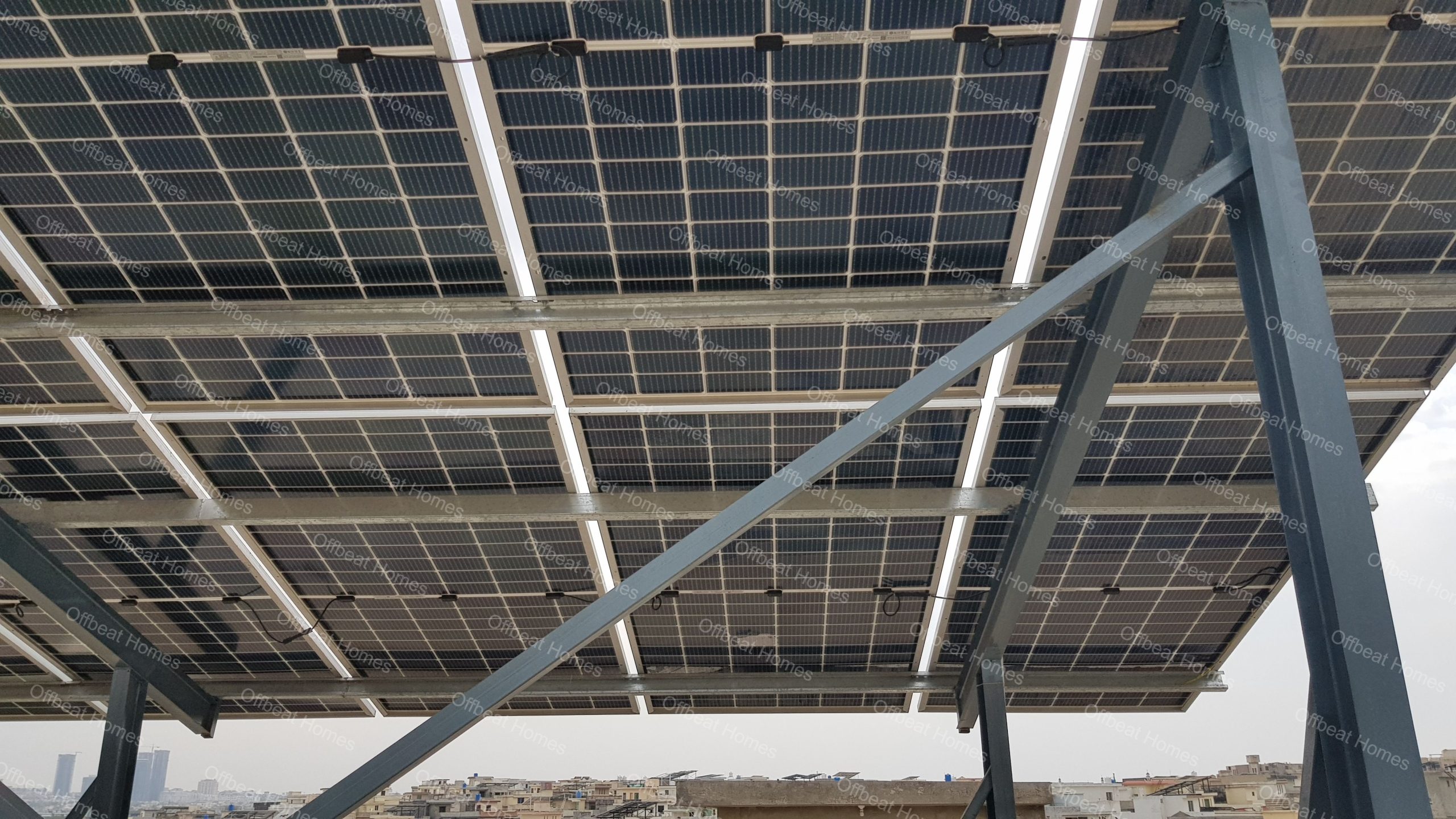 Residential rooftop solar setup by Offbeat Homes showing tailored panel mounting